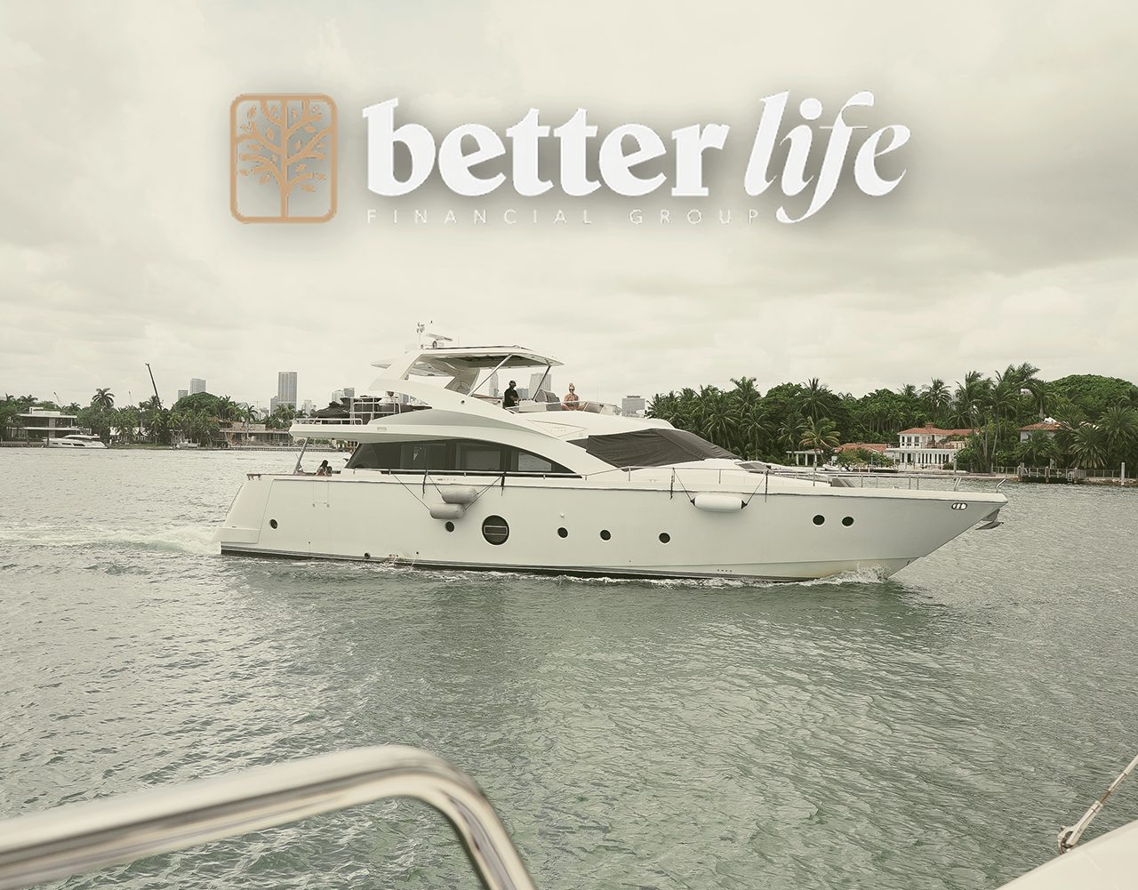 Yacht cruising the Miami waterfront under the Better Life logo, BLFG yacht event
