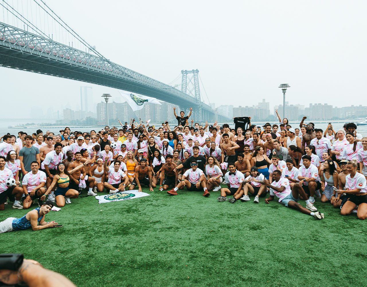 Hundreds of NAMELESS Run Club runners gathered on turf under a New York bridge for SOUND TRAK Vol. 1